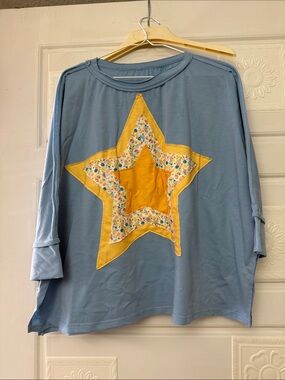 NWOT top size large. Great for July 4